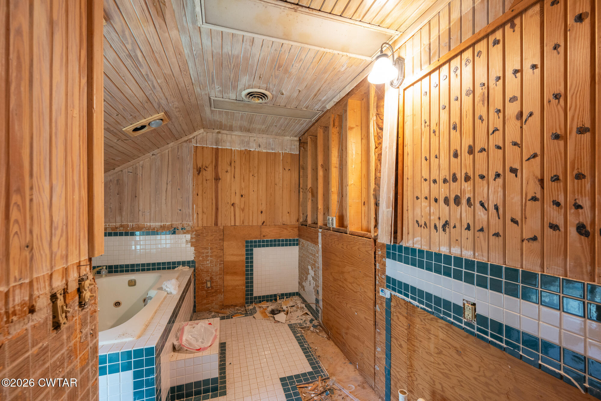 101 Red Ribbon Road Westport, TN 38387 - Photo 37 of 51 a bathroom with a granite countertop sink and a mirror