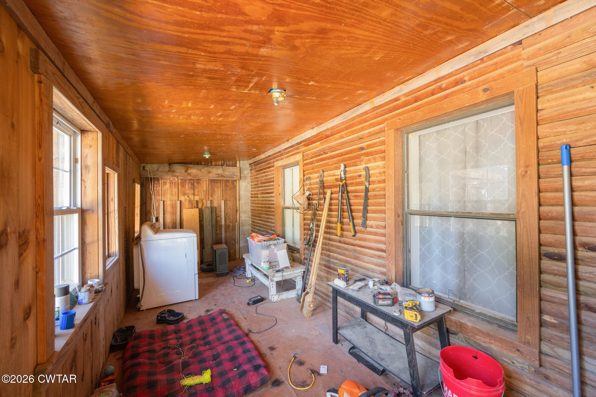 101 Red Ribbon Road Westport, TN 38387 - Photo 41 of 51 a living room with furniture and a floor to ceiling window