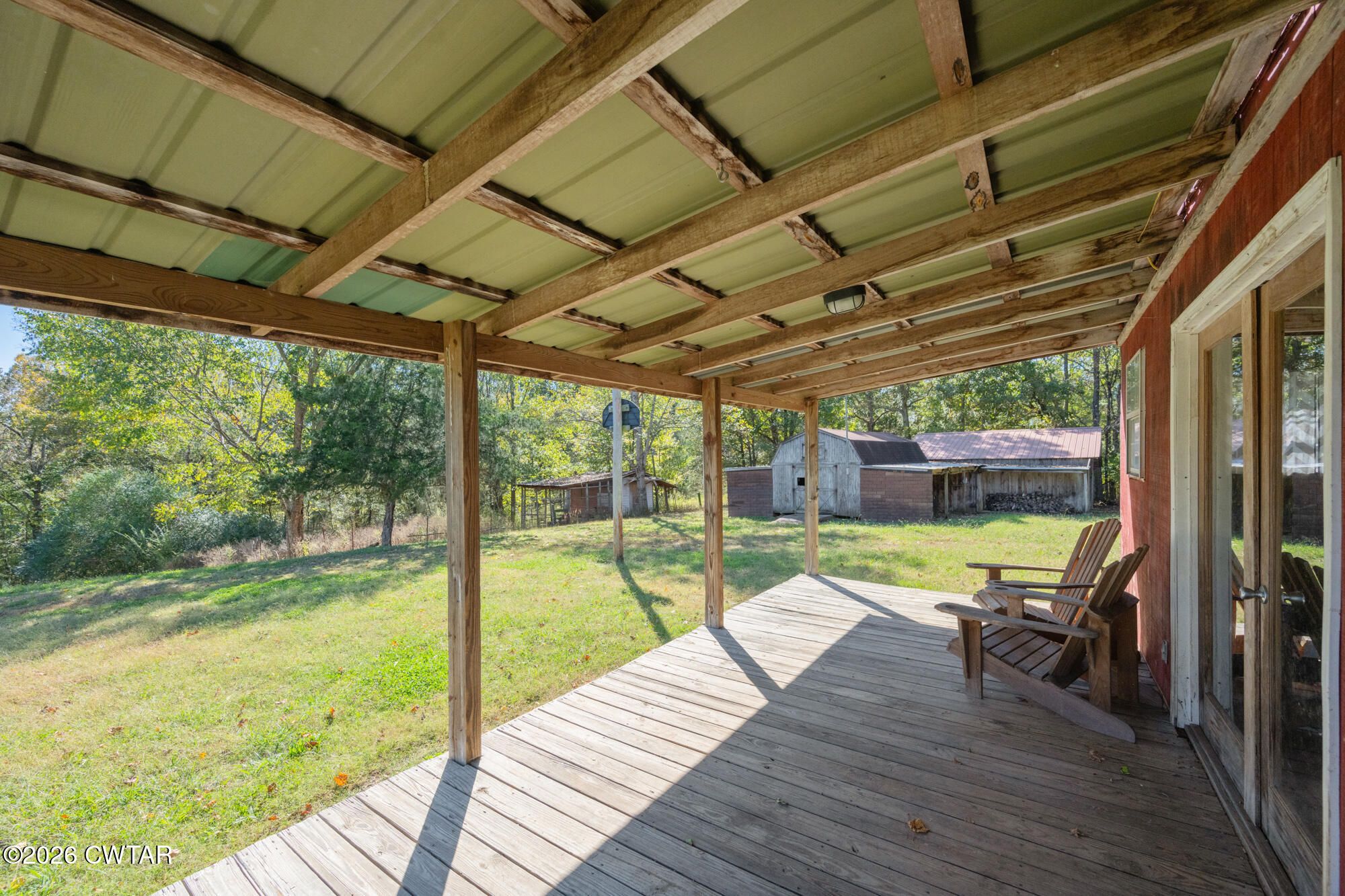 101 Red Ribbon Road Westport, TN 38387 - Photo 42 of 51 a view of swimming pool with a patio