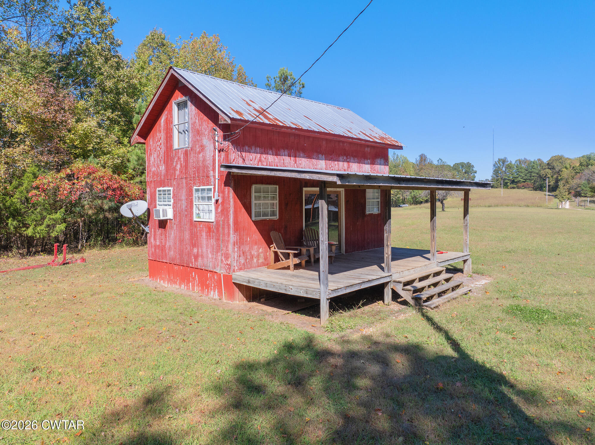 101 Red Ribbon Road Westport, TN 38387 - Photo 43 of 51 a view of a house with pool