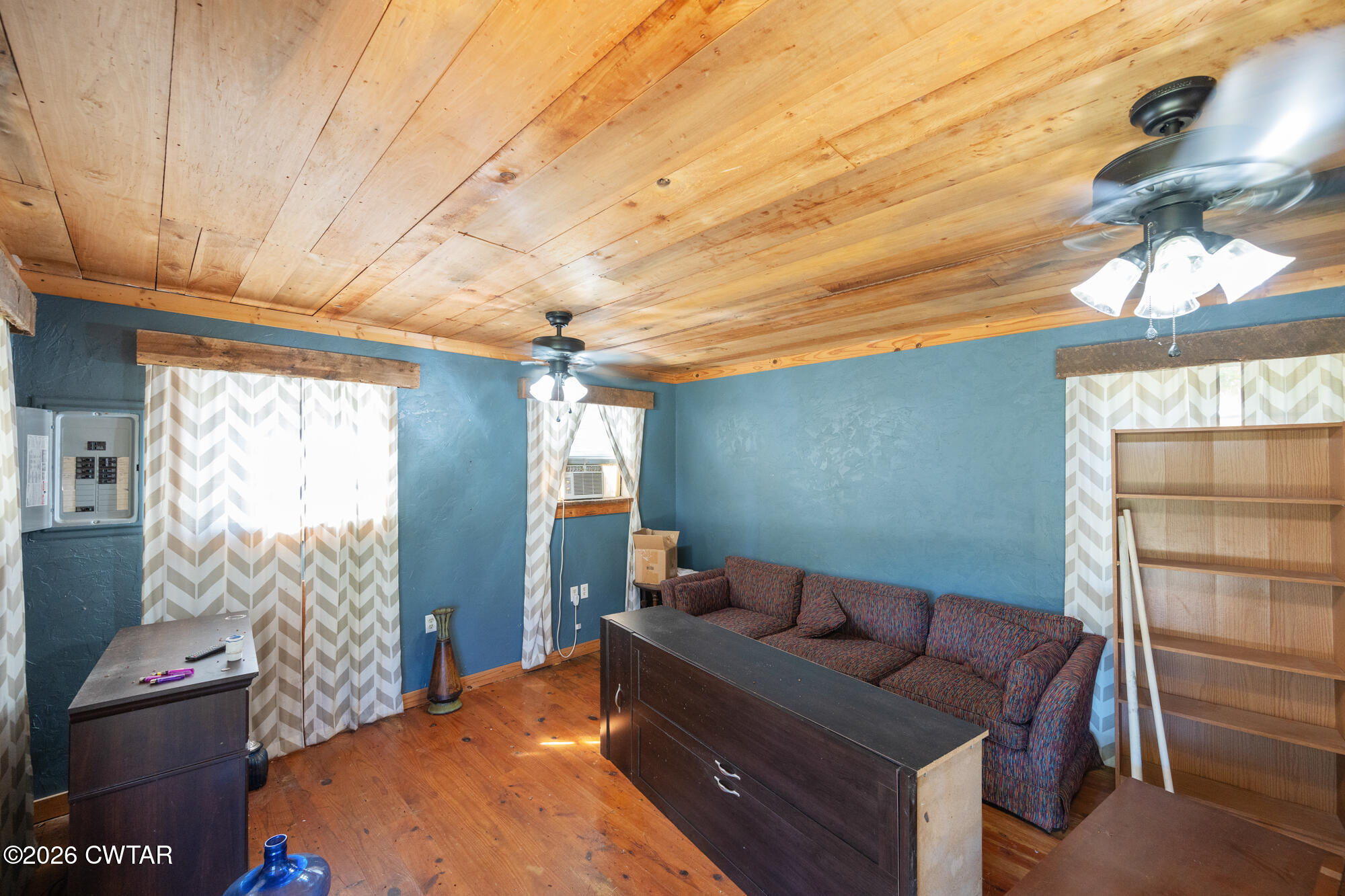 101 Red Ribbon Road Westport, TN 38387 - Photo 45 of 51 a bedroom with furniture and a window