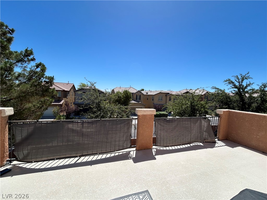 6538 Elm Spring Las Vegas, NV 89148 - Photo 26 of 29 Enjoy neighborhood views from this private, generously proportioned outdoor terrace.