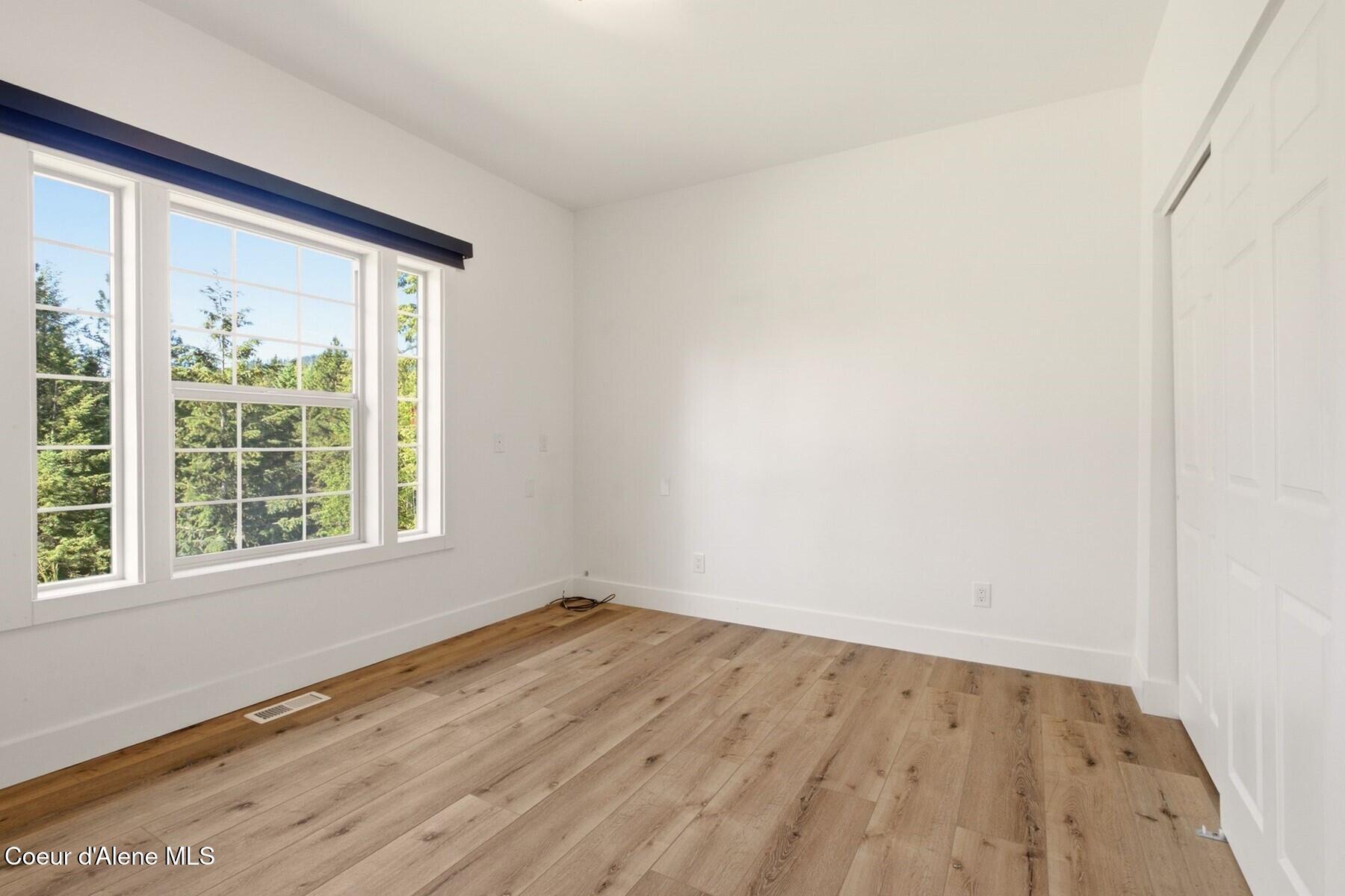 10988 West Thompson Road Coeur D'Alene, ID 83814 - Photo 36 of 71 Main Floor Guest Bedroom