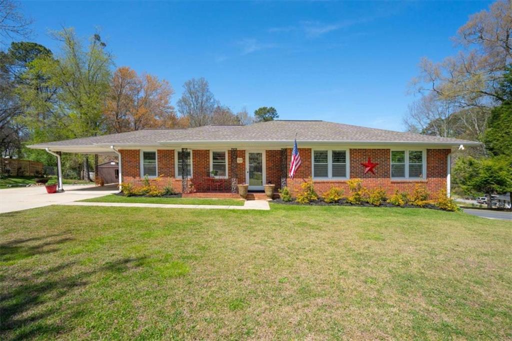 522 Hickory Street Bremen, GA 30110 - Photo 1 of 64 a view of a house with a backyard