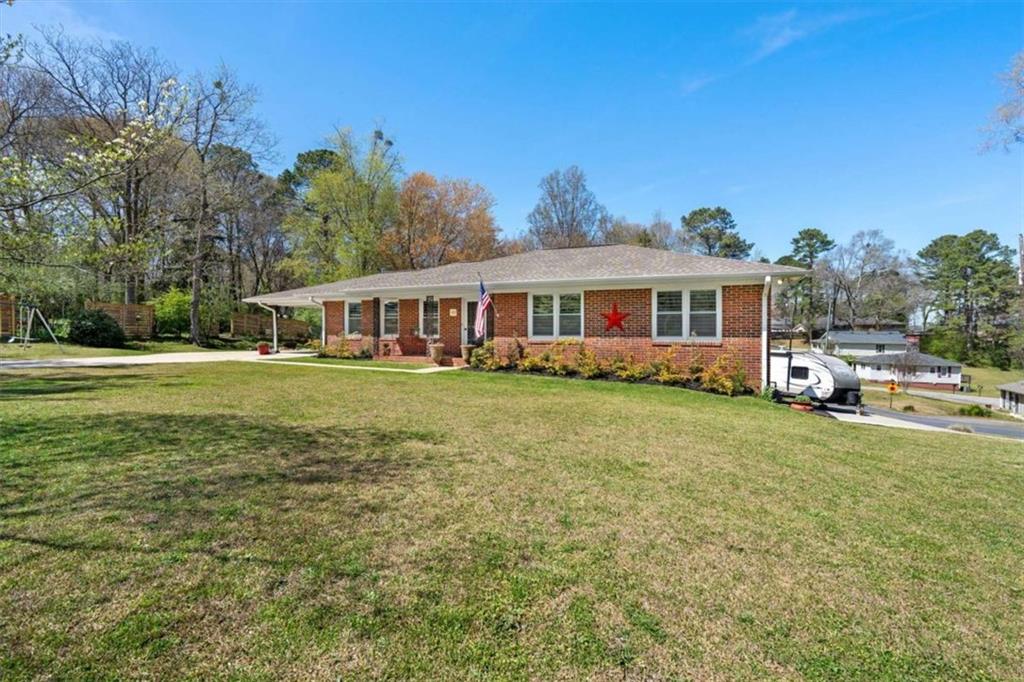 522 Hickory Street Bremen, GA 30110 - Photo 4 of 64 a view of a house with a big yard