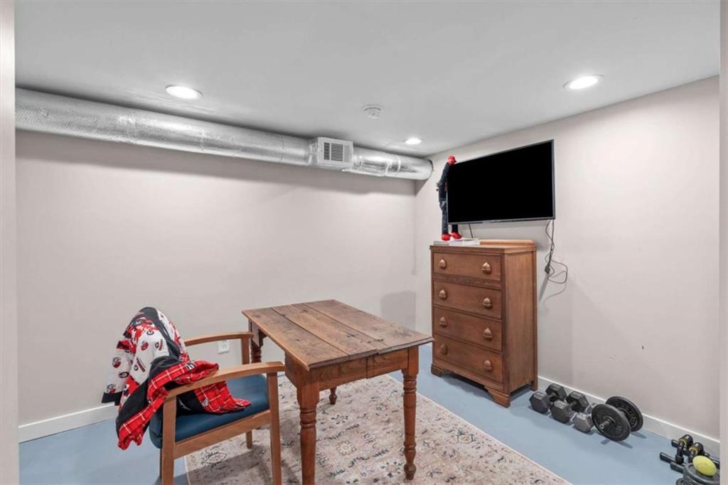 522 Hickory Street Bremen, GA 30110 - Photo 52 of 64 a room with furniture and flat screen tv