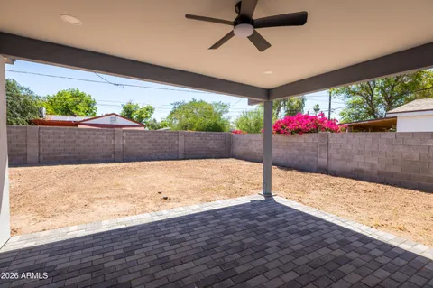 a front view of house with yard and seating area