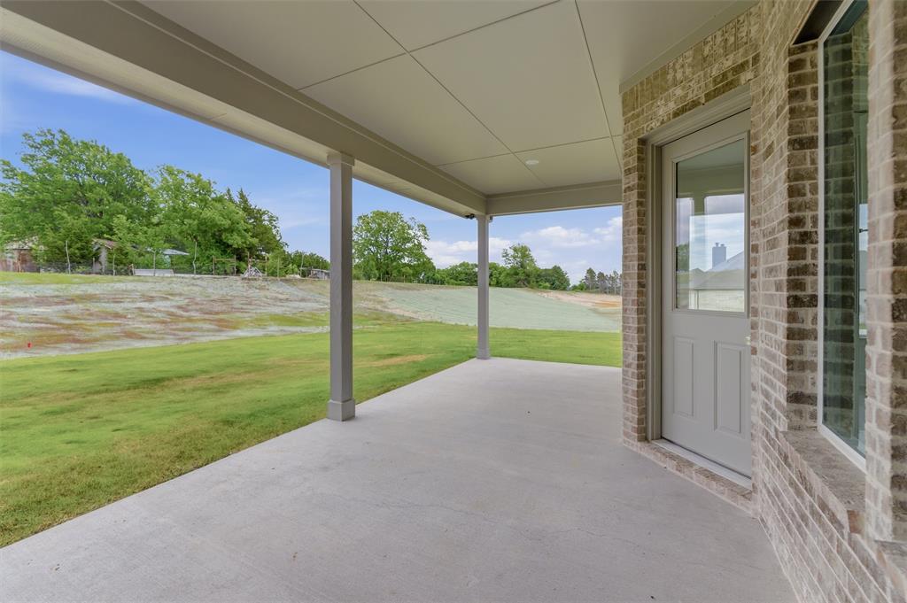 906 Perrin Lane Van Alstyne, TX 75495 - Photo 26 of 30 a view of a house with a big yard and large tree