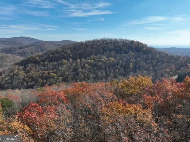 a view of mountains and valleys