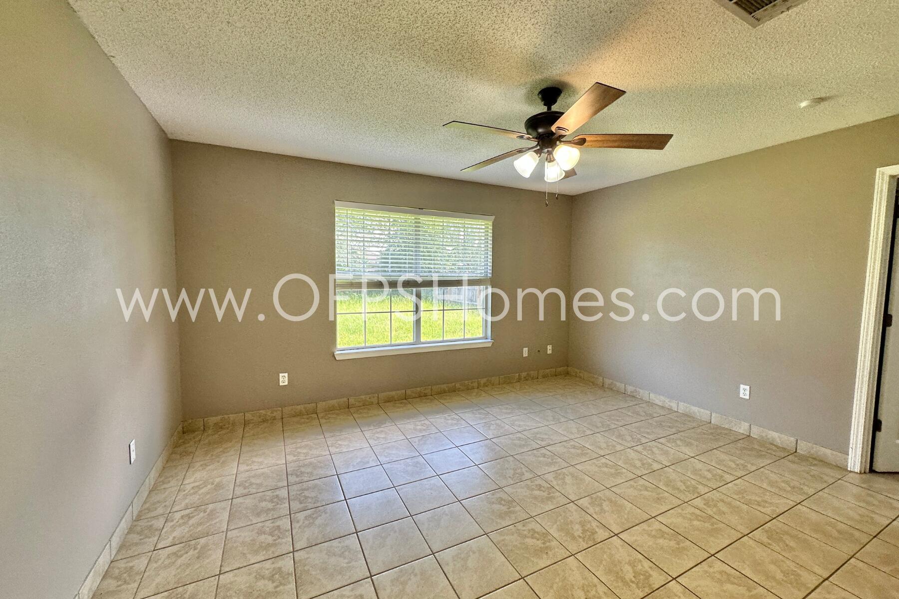 2837 Atoka Trail Crestview, FL 32539 - Photo 13 of 17 a view of an empty room and window