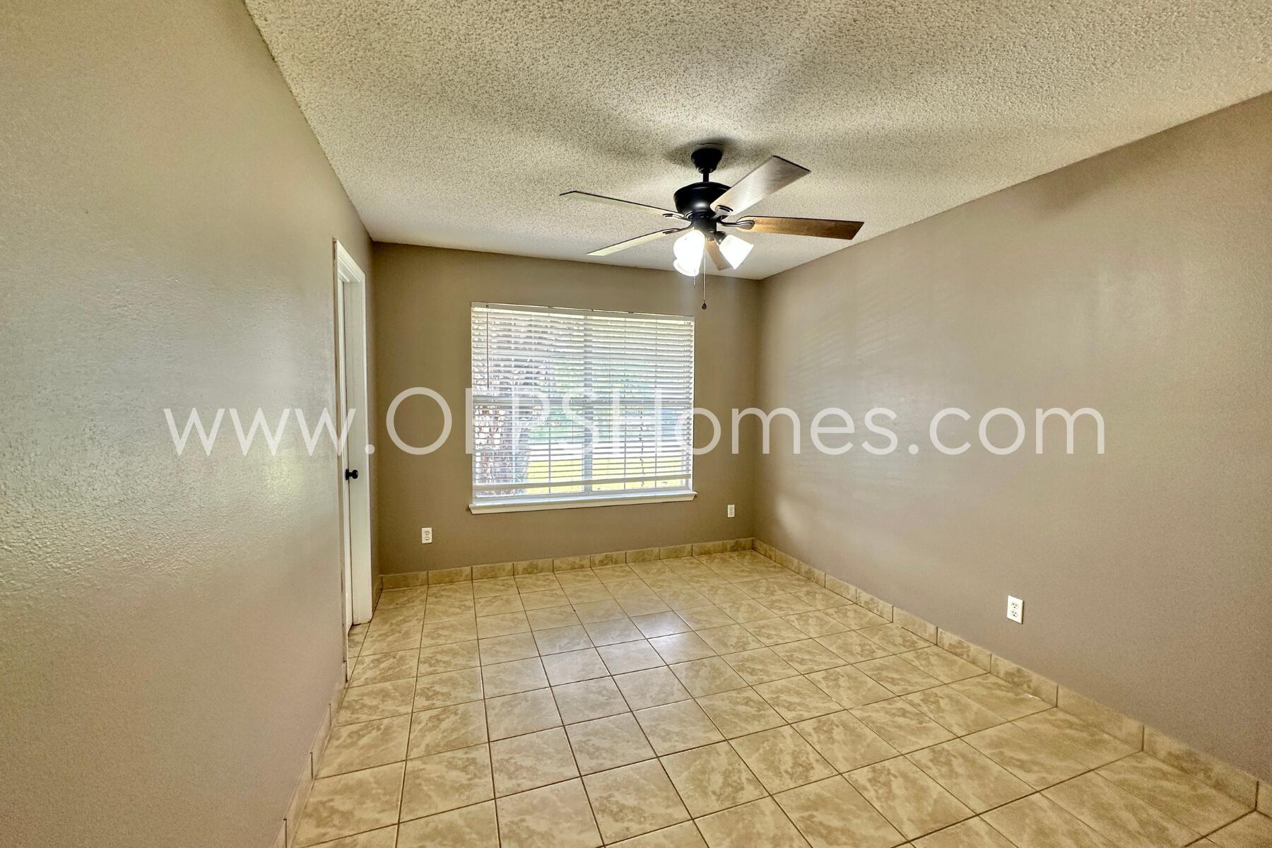2837 Atoka Trail Crestview, FL 32539 - Photo 8 of 17 a view of an empty room with a window