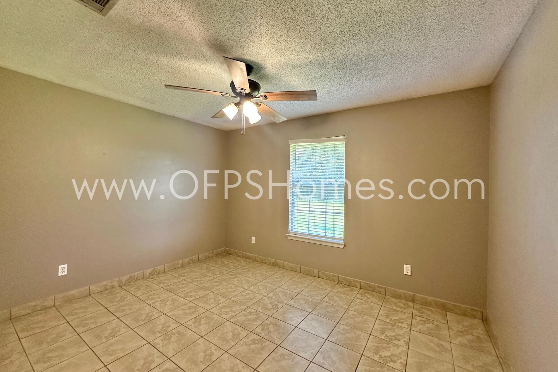 2837 Atoka Trail Crestview, FL 32539 - Photo 10 of 17 a view of an empty room with a window