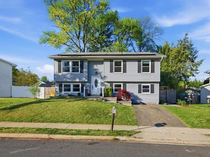 a view of a yard in front of a house