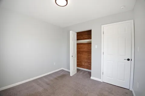 an empty room with closet