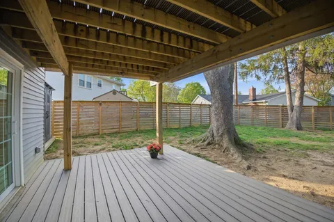 a view of a porch with wooden floor