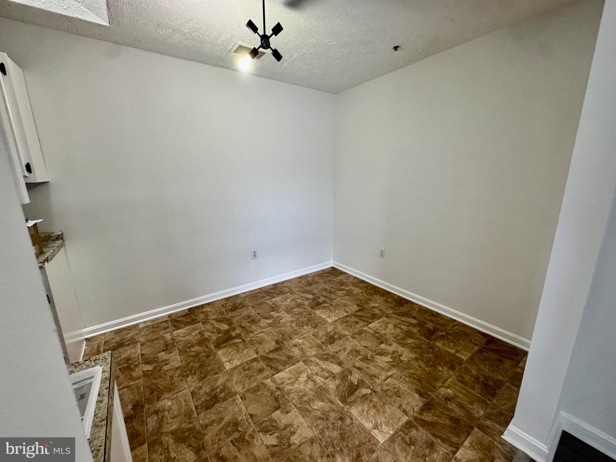 1290 South Ox Road Woodstock, VA 22664 - Photo 4 of 13 a view of empty room with a window