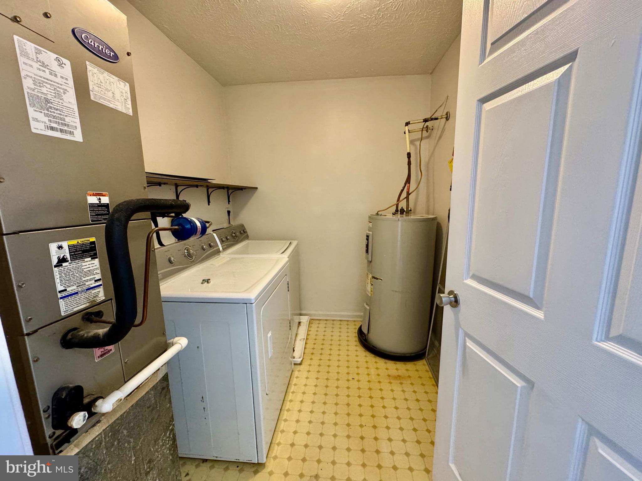 1290 South Ox Road Woodstock, VA 22664 - Photo 9 of 13 a room with water heater and storage