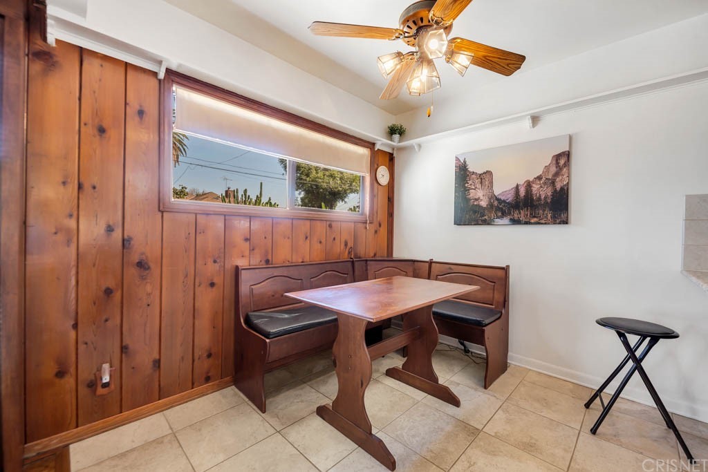 18649 Willard Street Reseda, CA 91335 - Photo 12 of 38 a view of a room with furniture and a chandelier fan