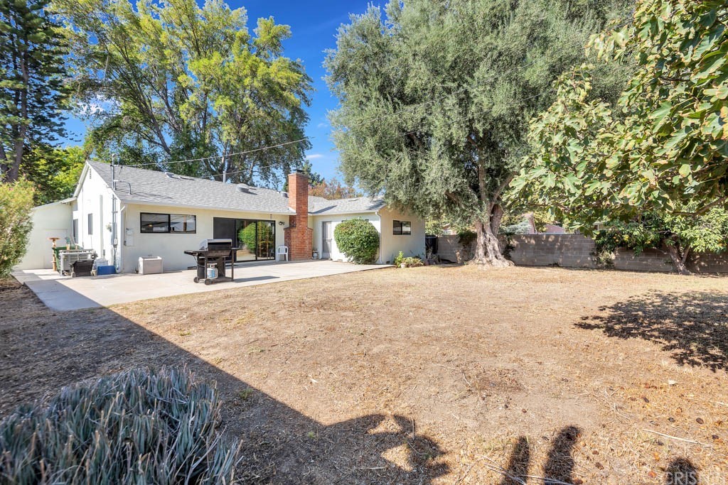 18649 Willard Street Reseda, CA 91335 - Photo 29 of 38 a house with trees in front of it