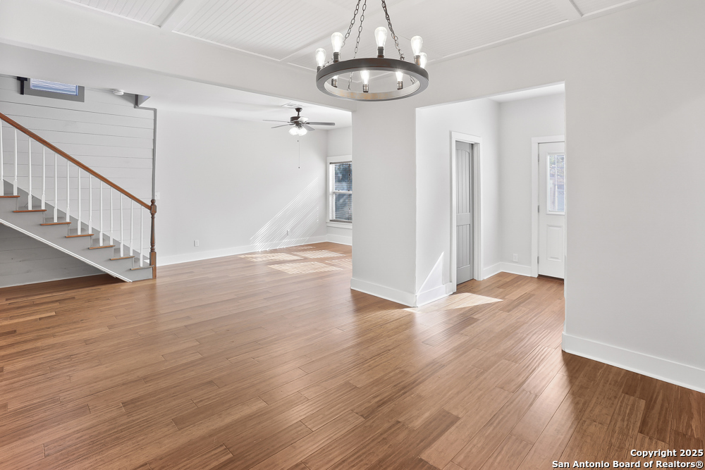 138 Perry Court, Unit 2 San Antonio, TX 78209 - Photo 12 of 29 a view of empty room with wooden floor