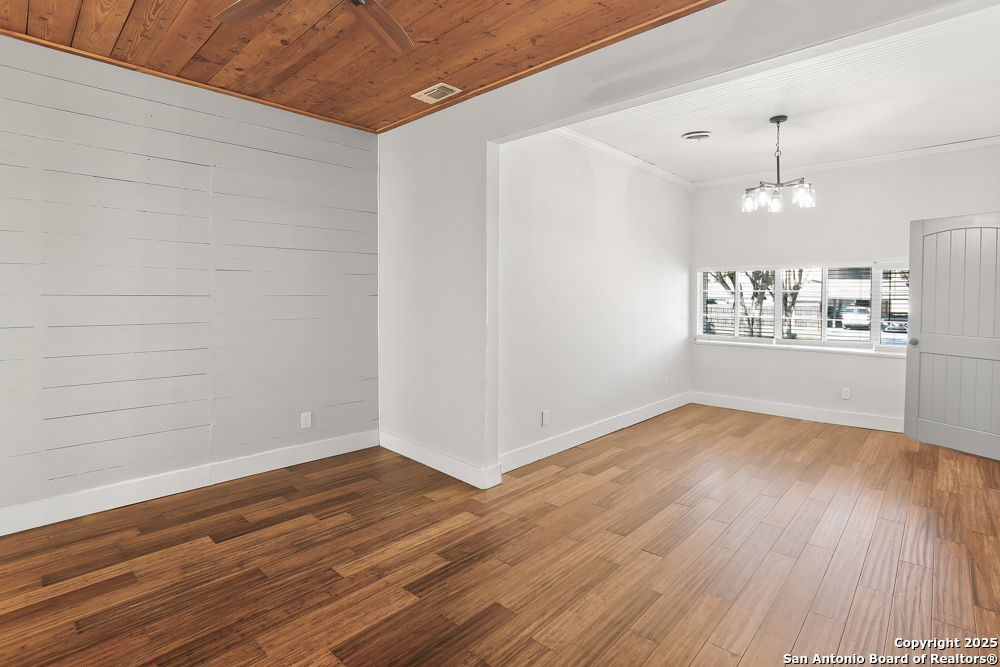 138 Perry Court, Unit 2 San Antonio, TX 78209 - Photo 18 of 29 a view of a room with wooden floors and kitchen view