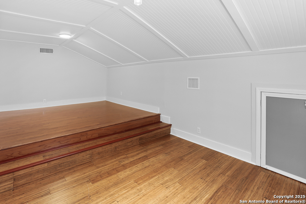 138 Perry Court, Unit 2 San Antonio, TX 78209 - Photo 21 of 29 a view of room with wooden floor