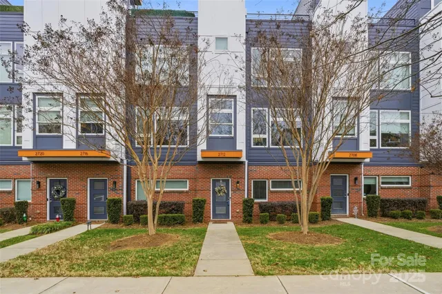 front view of a building with a yard