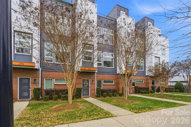 a kitchen that has a lot of cabinets in it