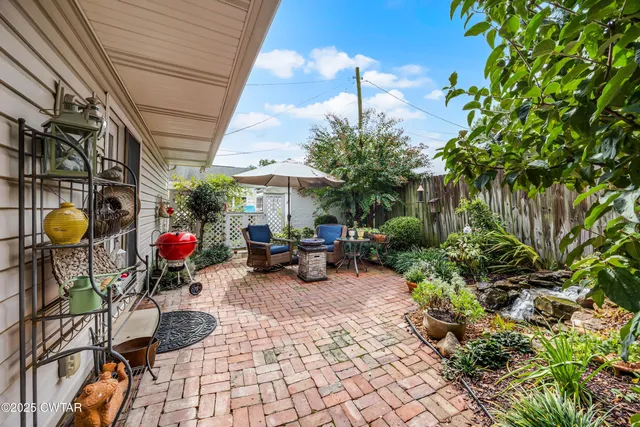 a view of a chairs and tables in patio