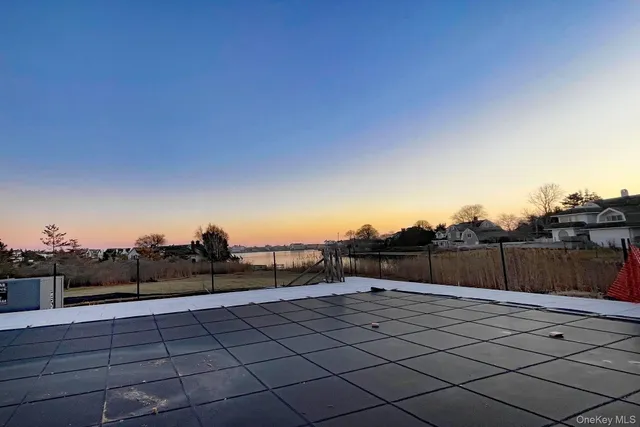 a view of an empty room with a sliding door