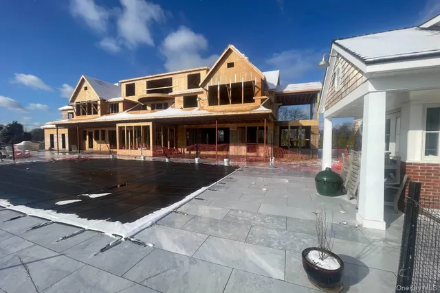 a view of a water fountain and a many windows