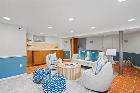 a living room with furniture and a table