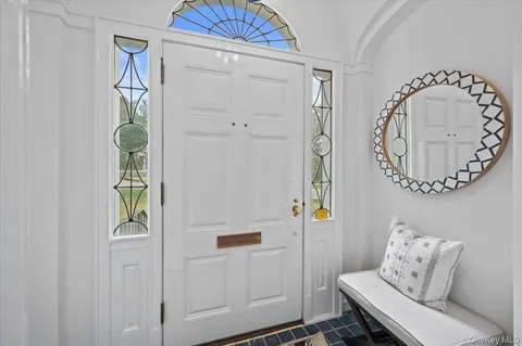 a living room with furniture and a table