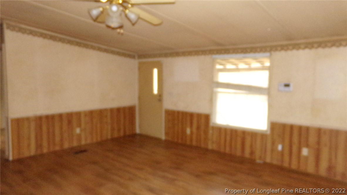 128 Dodson Road Rockingham, NC 28379 - Photo 15 of 25 a view of an empty room and a window