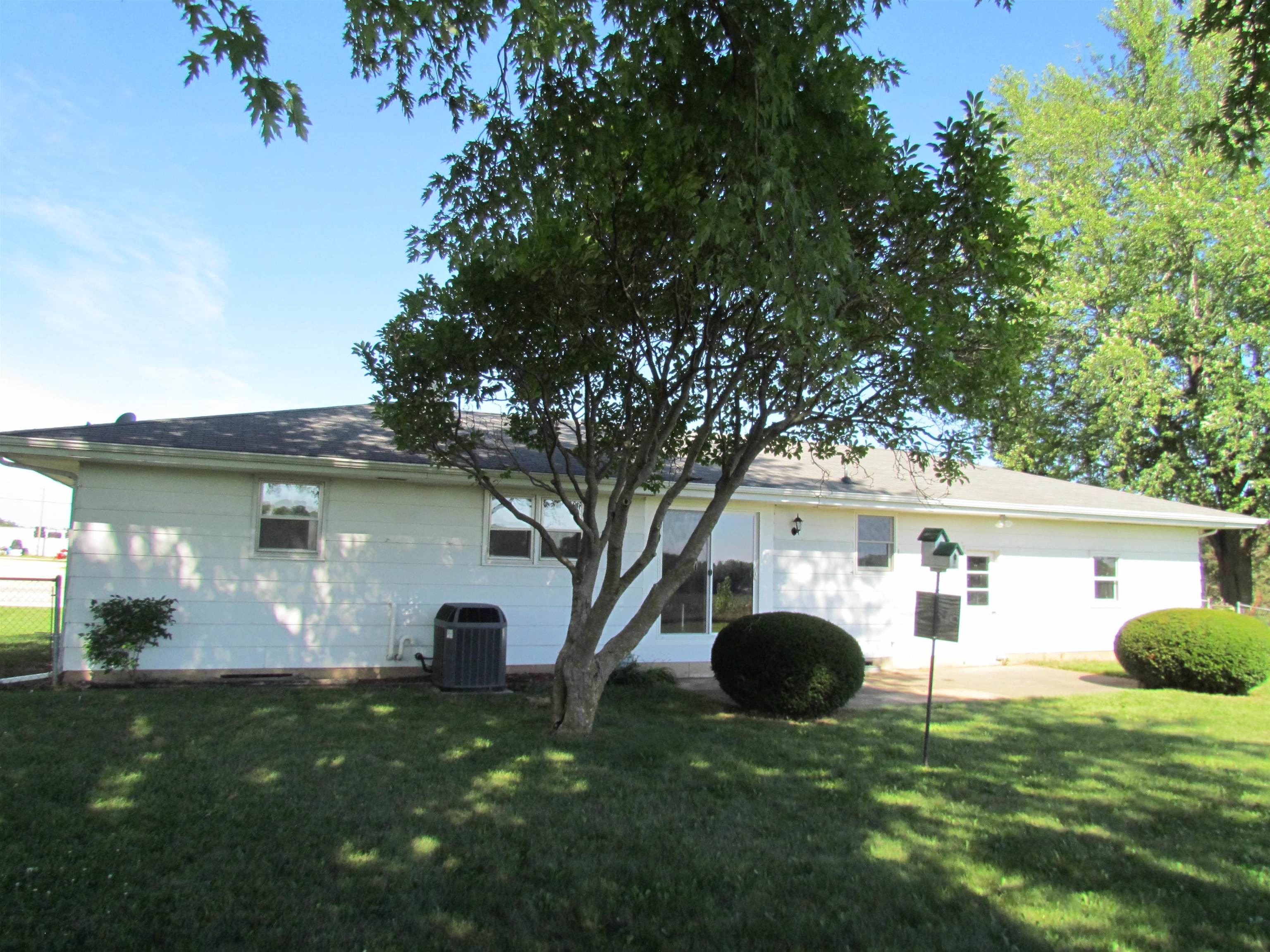 2475 North Pecatonica Road Pecatonica, IL 61063 - Photo 1 of 36 a view of a house with a backyard