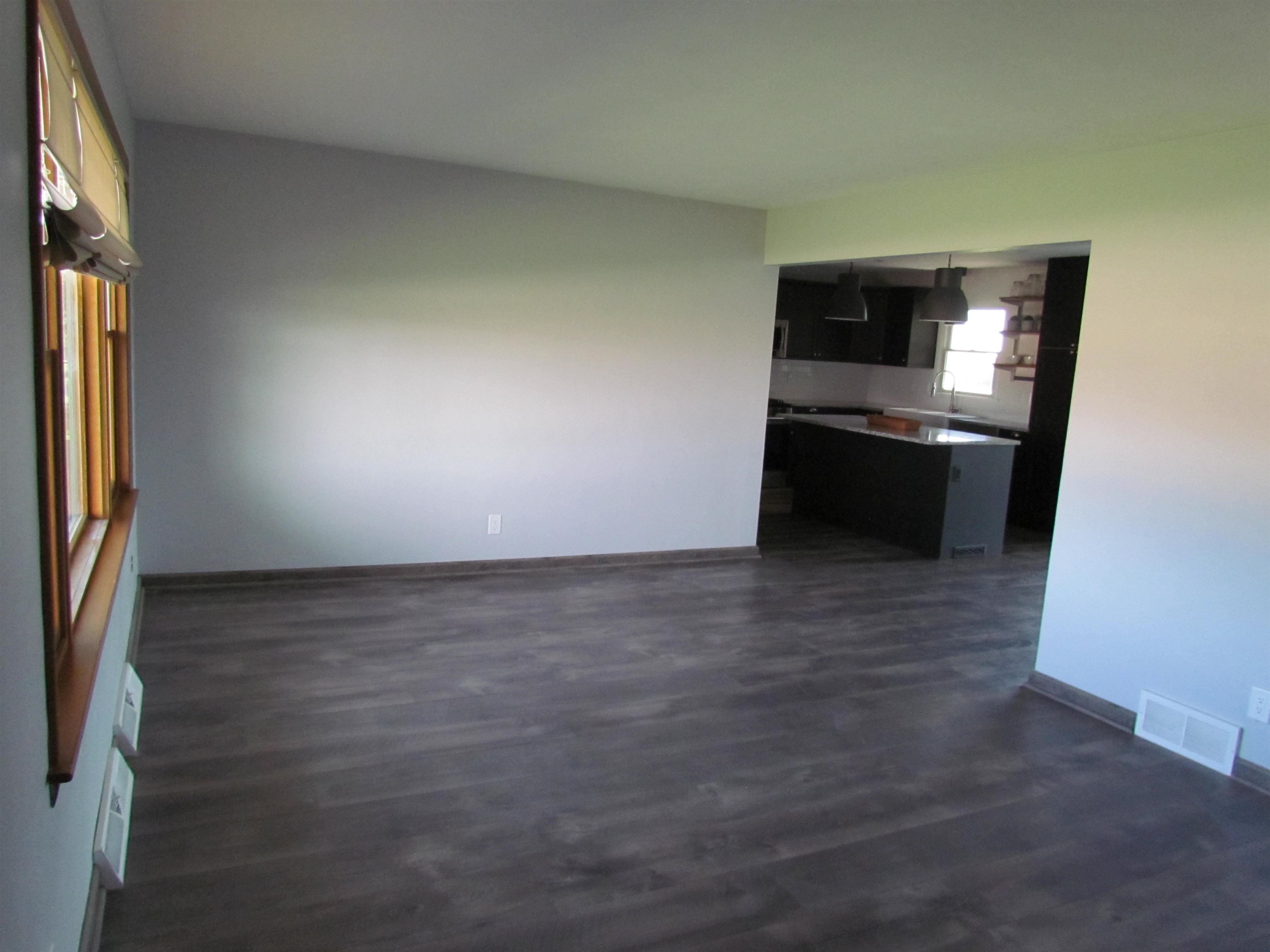 2475 North Pecatonica Road Pecatonica, IL 61063 - Photo 13 of 36 a view of kitchen with furniture and refrigerator