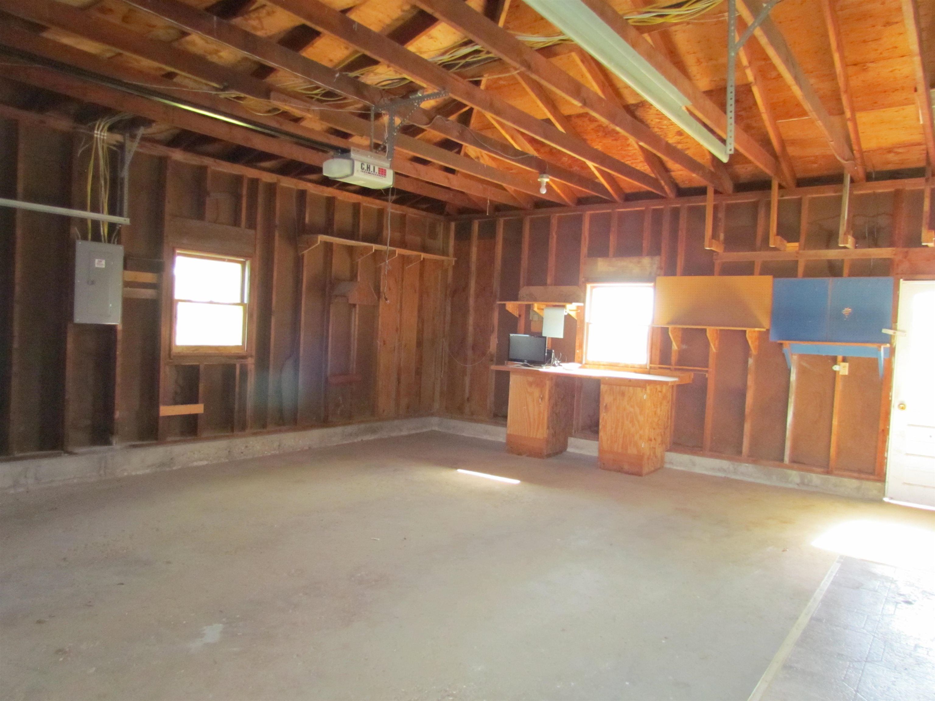 2475 North Pecatonica Road Pecatonica, IL 61063 - Photo 26 of 36 a view of a room with wooden walls