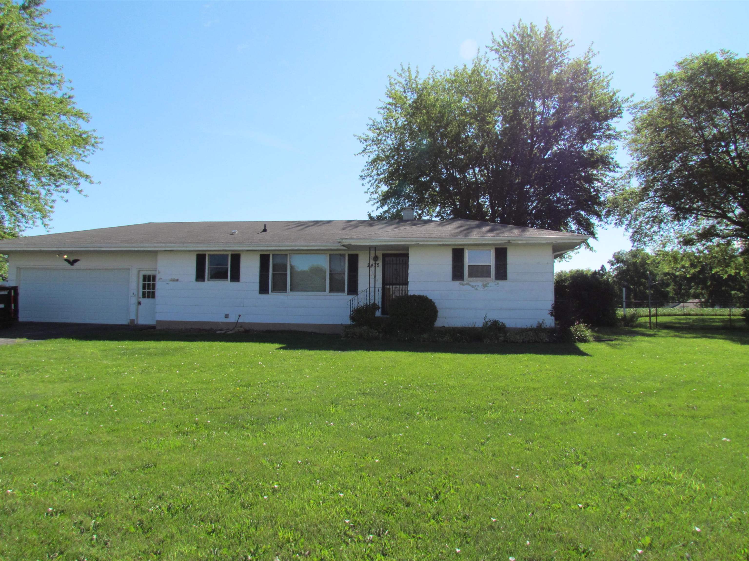 2475 North Pecatonica Road Pecatonica, IL 61063 - Photo 29 of 36 a view of a house with a backyard