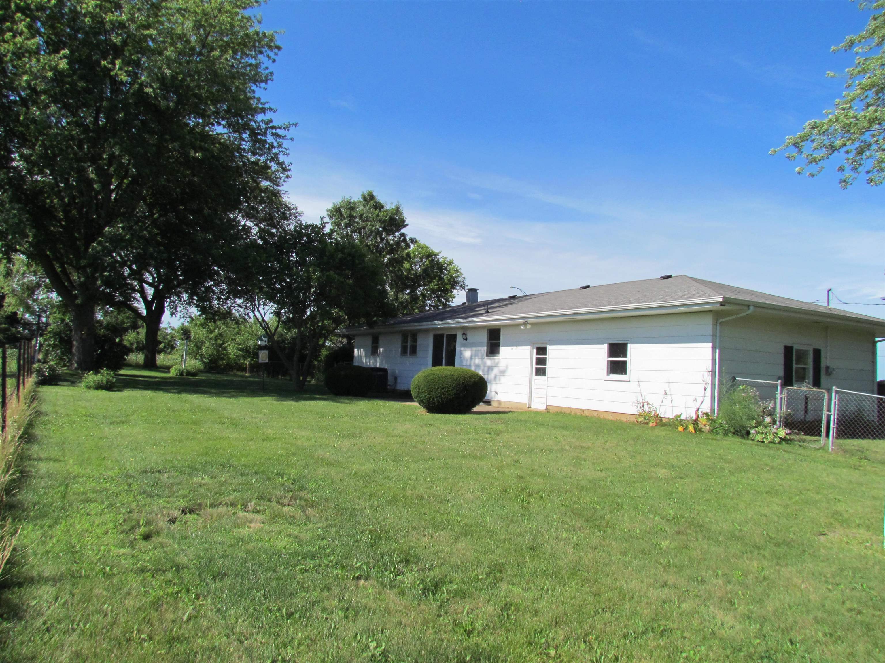 2475 North Pecatonica Road Pecatonica, IL 61063 - Photo 31 of 36 a view of a house with a backyard