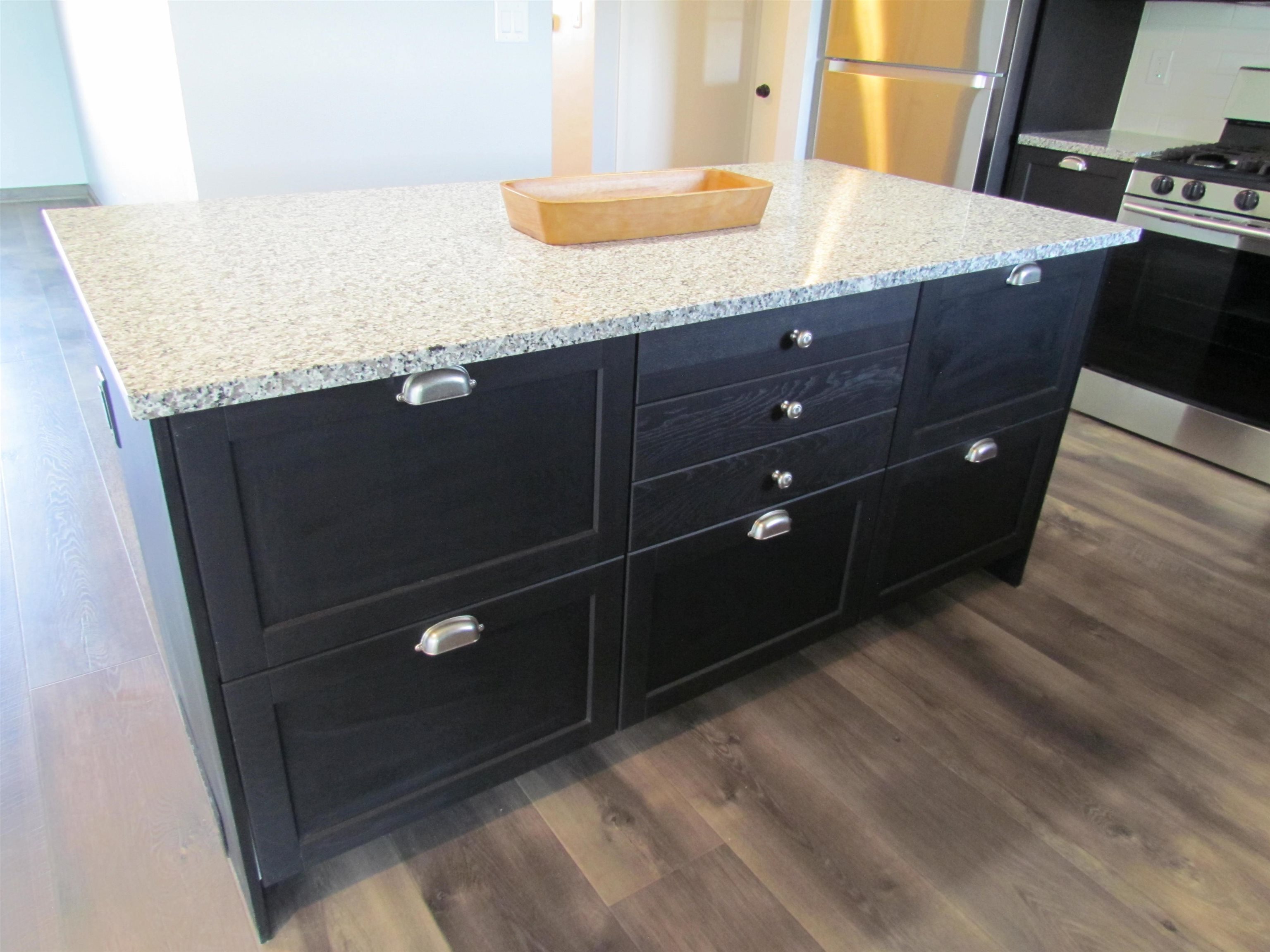 2475 North Pecatonica Road Pecatonica, IL 61063 - Photo 4 of 36 a room with granite countertop cabinets and wooden floor