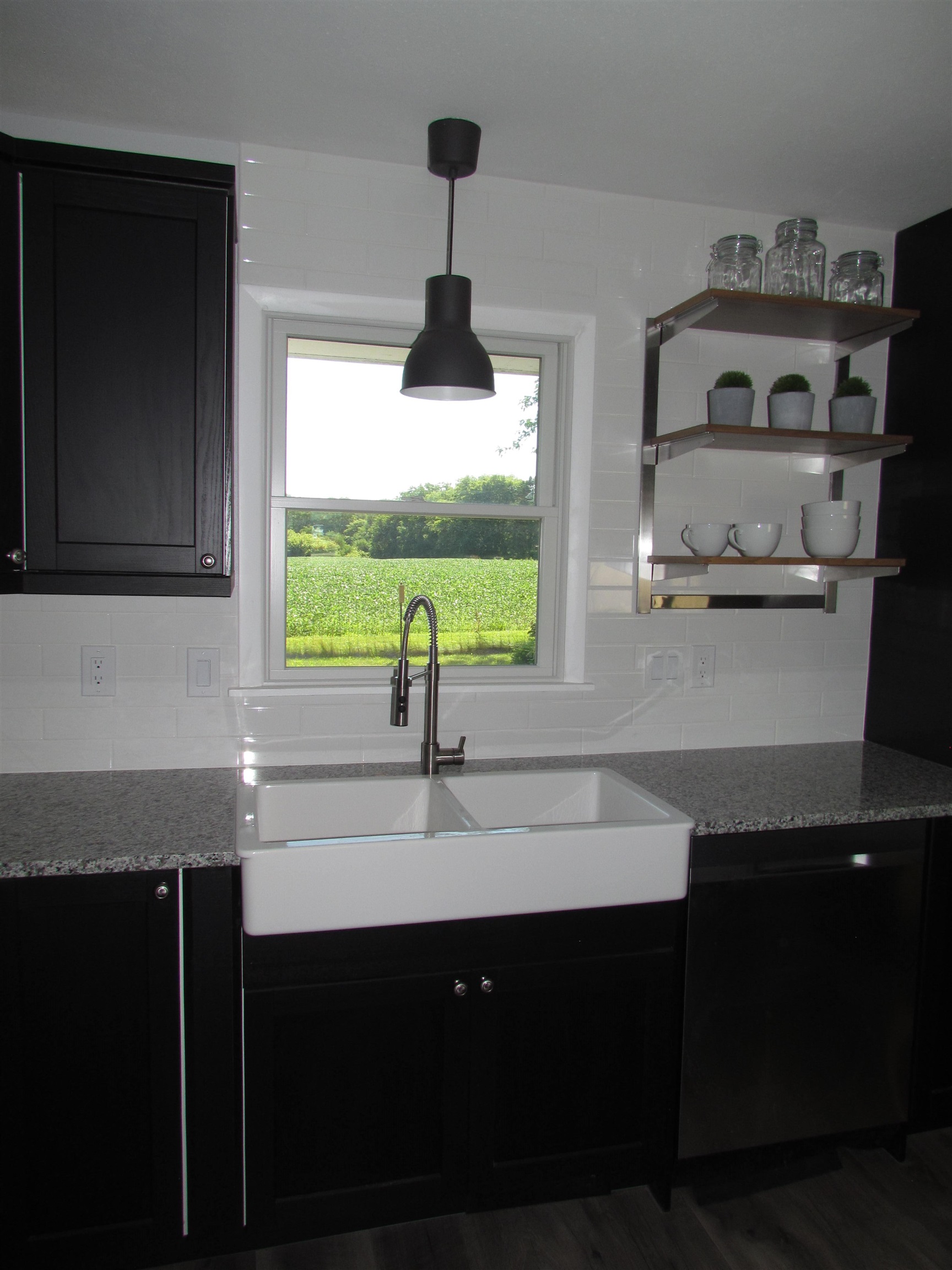 2475 North Pecatonica Road Pecatonica, IL 61063 - Photo 5 of 36 a kitchen with a sink and a window