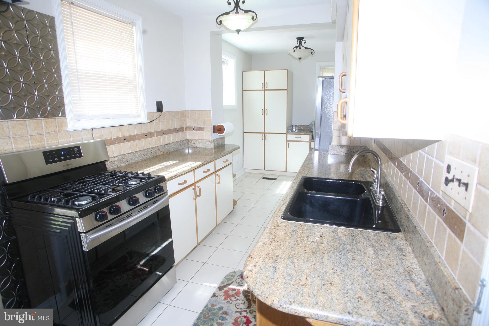 2 Dunmore Road Baltimore, MD 21228 - Photo 4 of 21 Kitchen with new appliances & granite counters