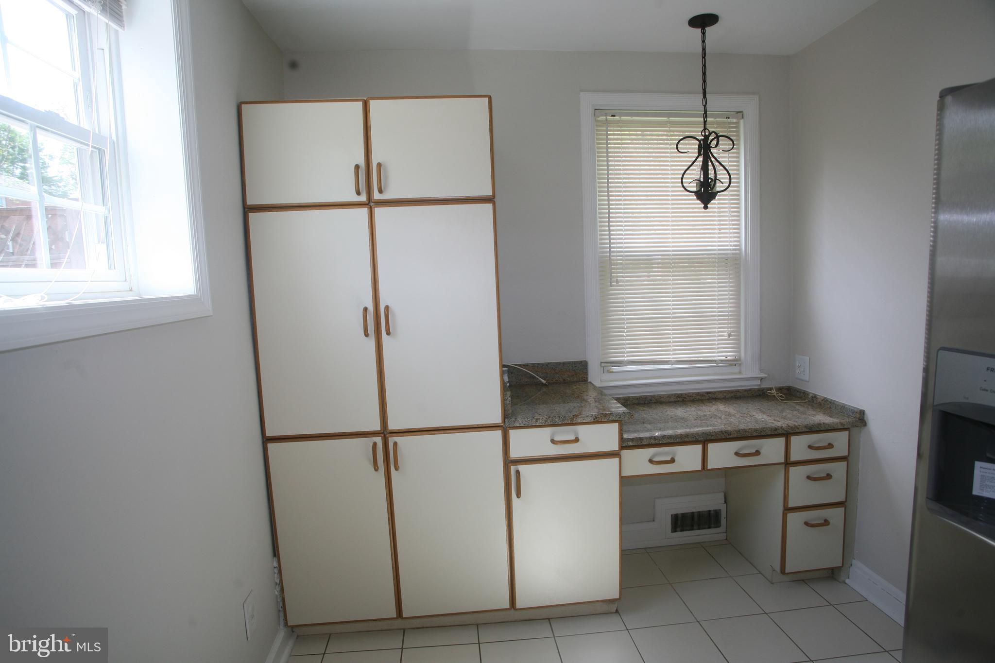 2 Dunmore Road Baltimore, MD 21228 - Photo 6 of 21 Kitchen"pantry" storage & bill payment/coupon desk