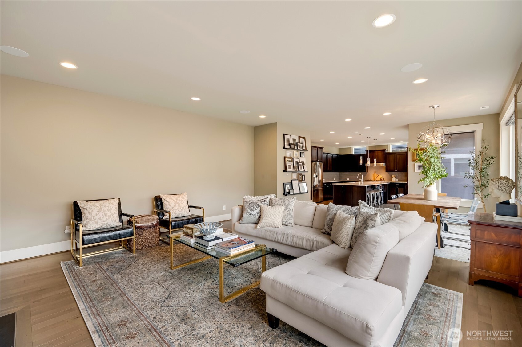 619 Graham Avenue Northeast Renton, WA 98059 - Photo 15 of 40 a living room with furniture kitchen view and a table