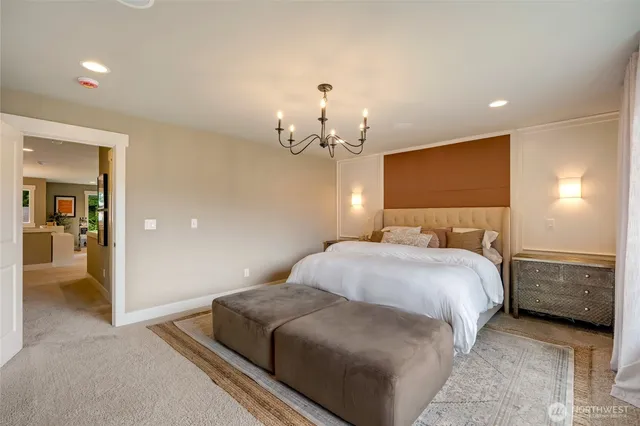 a bathroom with a bathtub and double sink