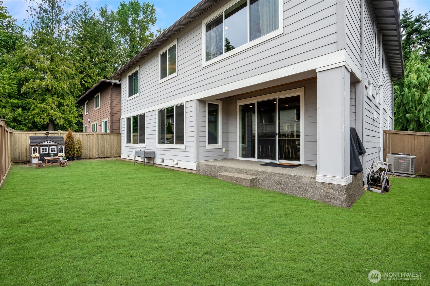 619 Graham Avenue Northeast Renton, WA 98059 - Photo 37 of 40 front view of a house with a yard