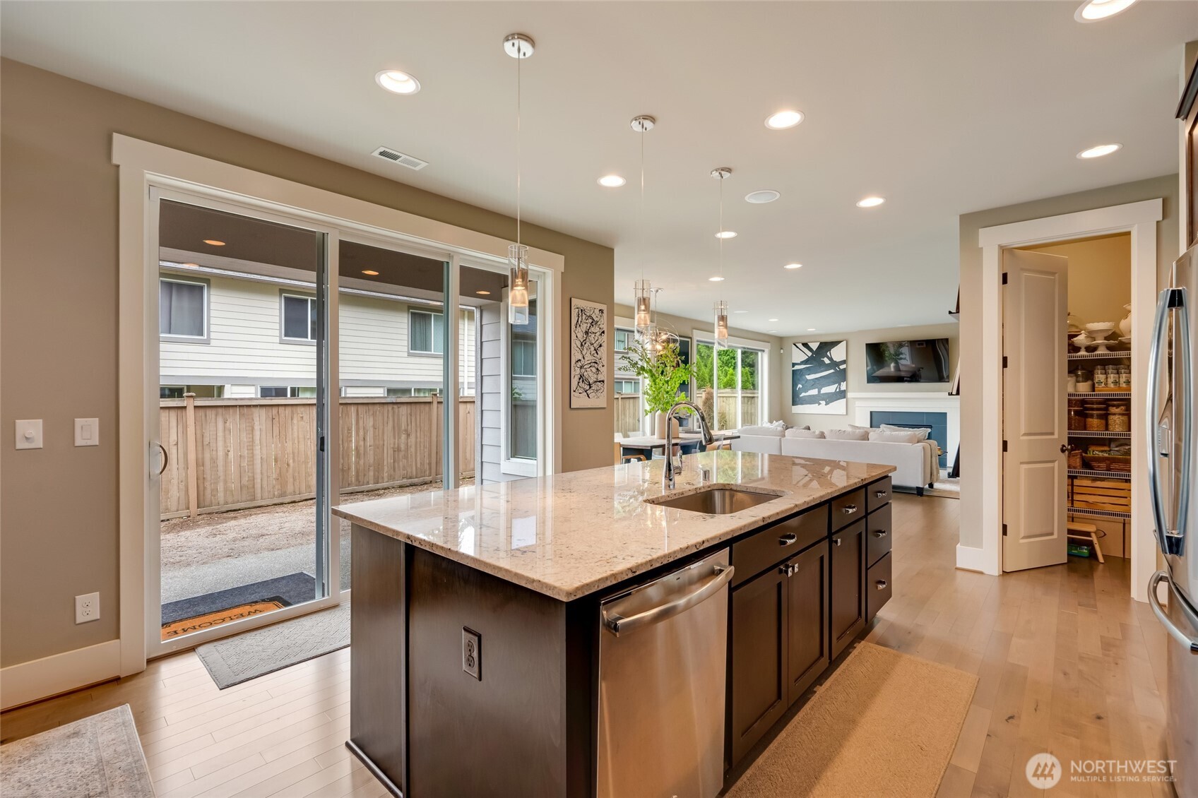 619 Graham Avenue Northeast Renton, WA 98059 - Photo 8 of 40 a kitchen with counter top space sink and refrigerator