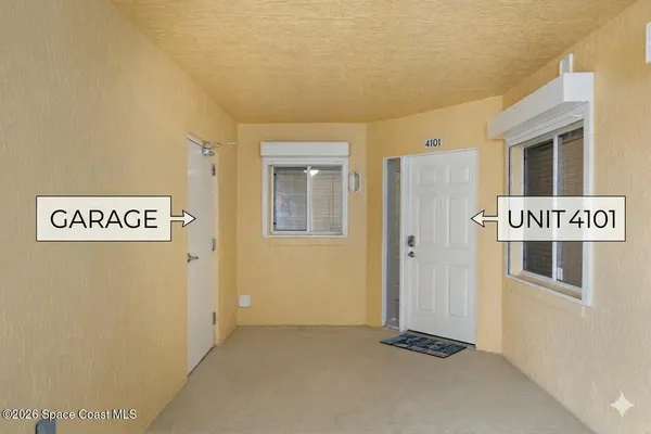 a view of a hallway with closet