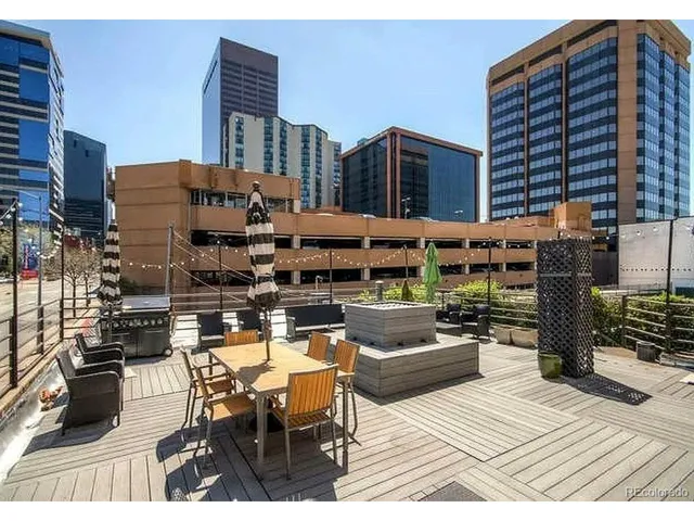 a view of swimming pool outdoor seating and plants