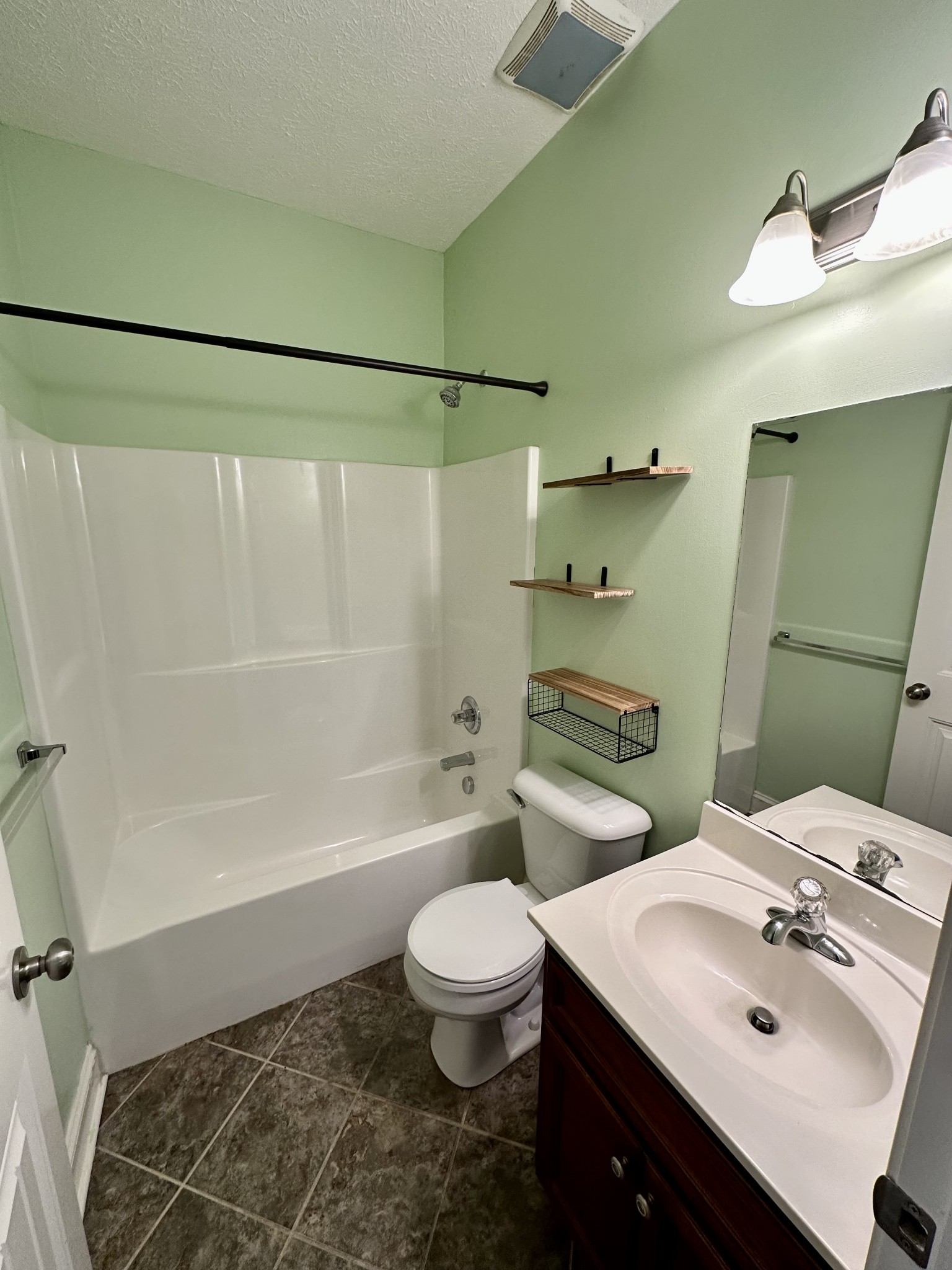 583 Neelys Bend Road Madison, TN 37115 - Photo 15 of 21 a bathroom with a sink toilet and shower